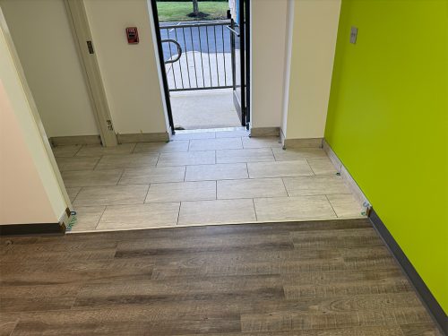 LVT Flooring with Transition to the Entrance