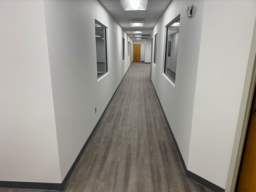 Luxury Vinyl Tile (LVT) Flooring Installation in Office Hallway